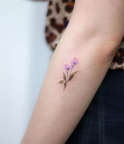 tiny lily tattoo